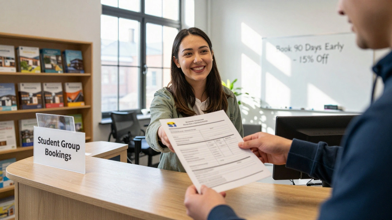 A student submitting a group booking form at a university accommodation office in Manchester.