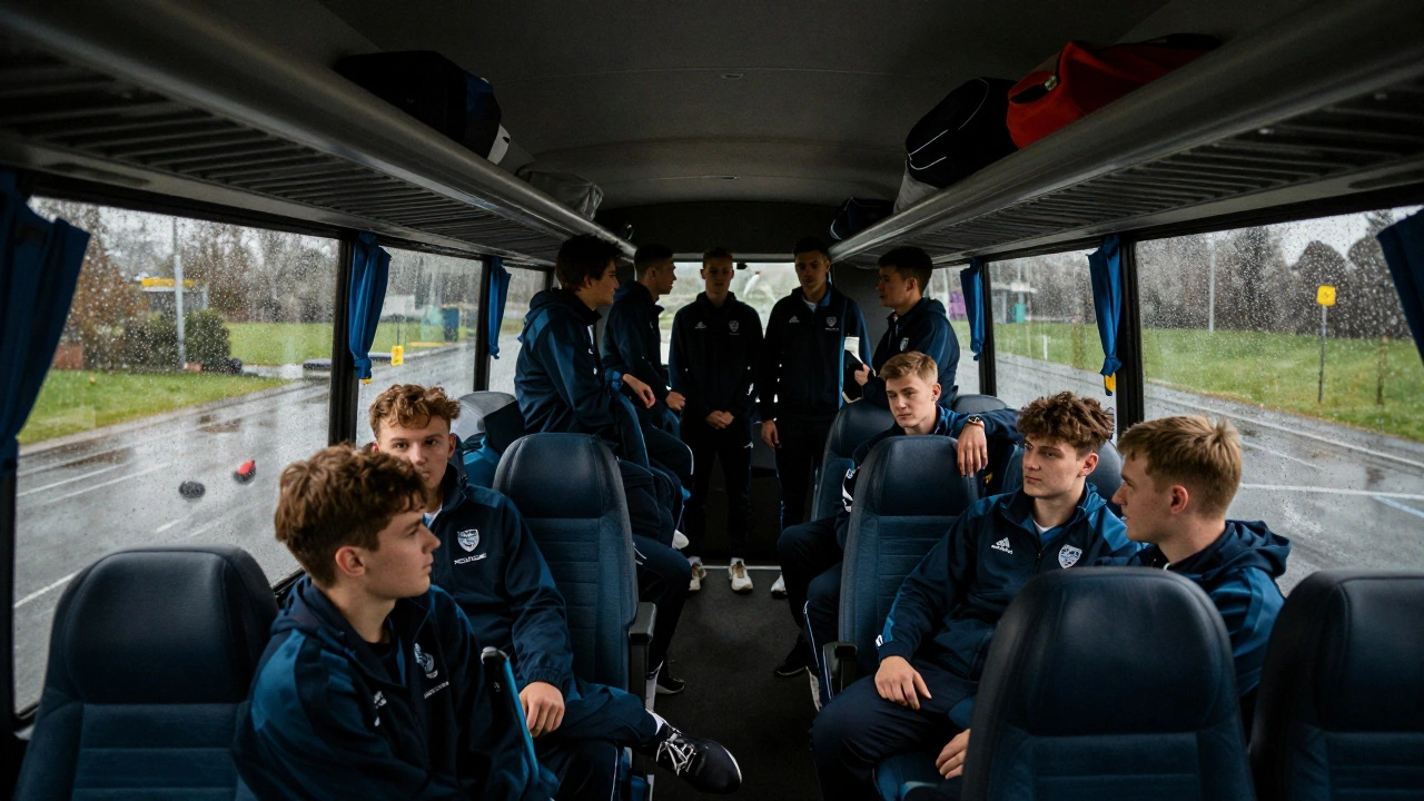 University sports teammates bonding on a coach trip to a rainy away match